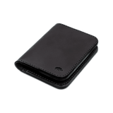 Black leather Portrait Wallet 3/4 angle view with hand-pressed Woolly Made logo.