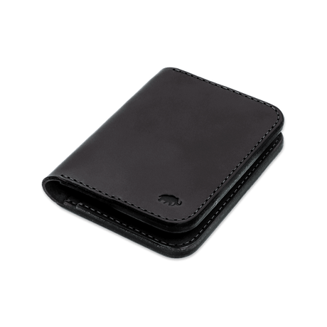 Black leather Portrait Wallet 3/4 angle view with hand-pressed Woolly Made logo.