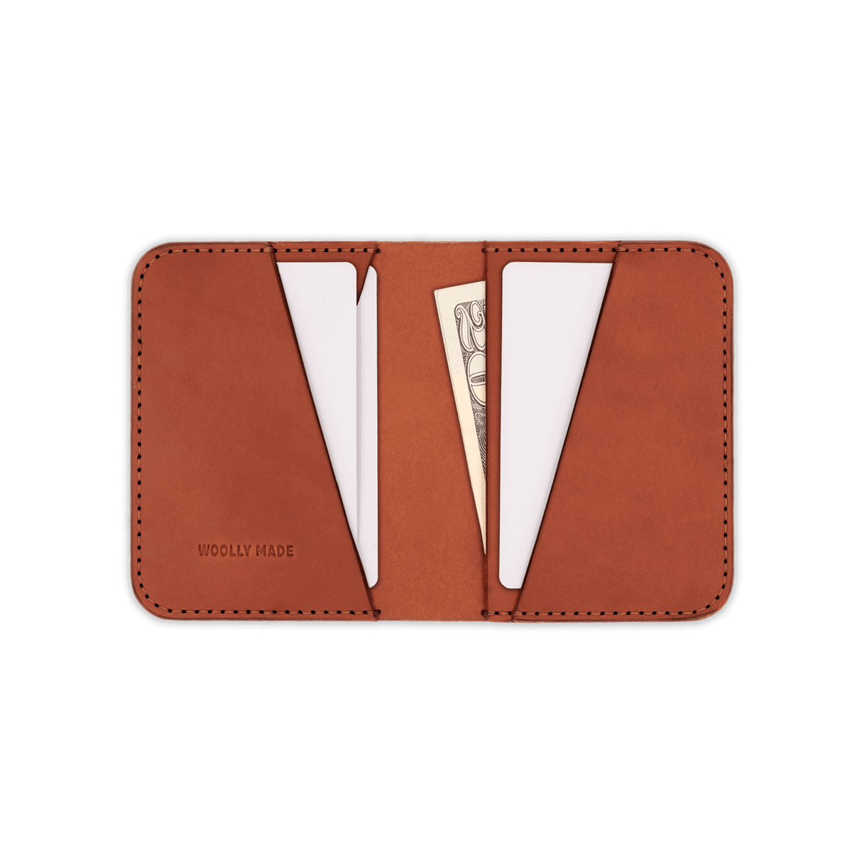 Brown leather Portrait Wallet, white cards, folded $20 bill, and hand-pressed Woolly Made logo.