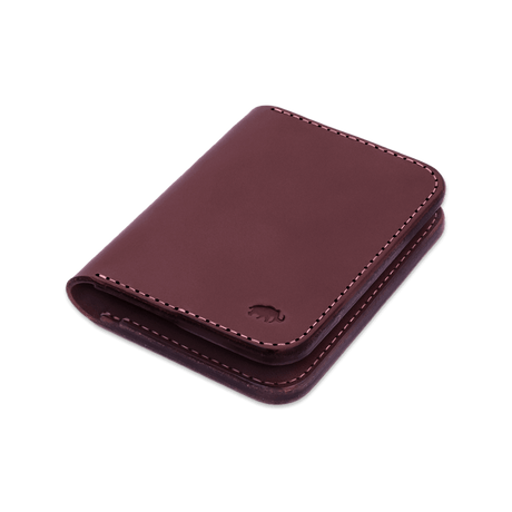 Burgundy leather Portrait Wallet 3/4 angle view with hand-pressed Woolly Made logo.