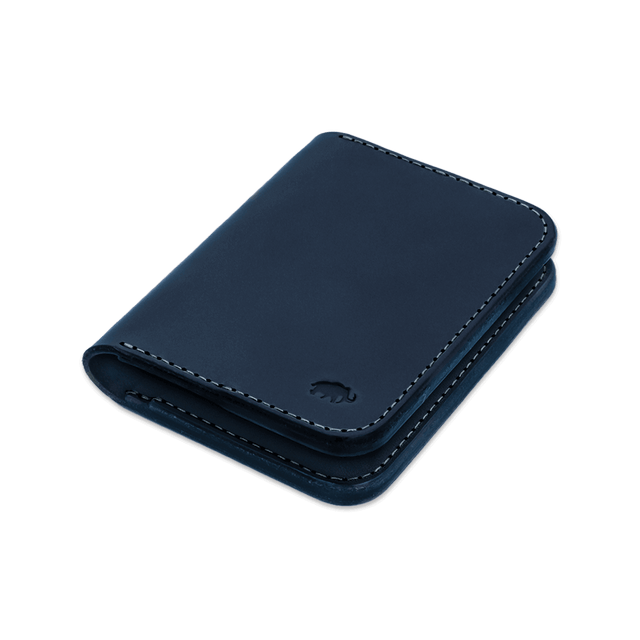 Navy leather Portrait Wallet 3/4 angle view with hand-pressed Woolly Made logo.