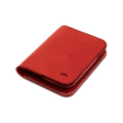 Red leather Portrait Wallet 3/4 angle view with hand-pressed Woolly Made logo.