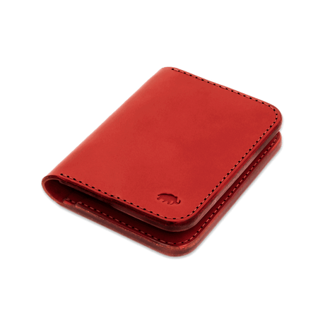 Red leather Portrait Wallet 3/4 angle view with hand-pressed Woolly Made logo.