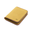 Yellow leather Portrait Wallet 3/4 angle view with hand-pressed Woolly Made logo.