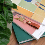 Snap Keychain in brown leather lifestyle photo.