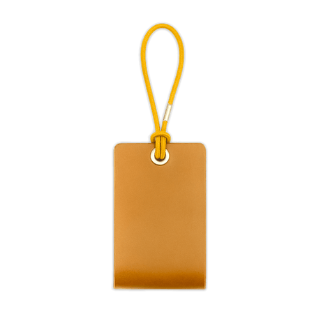 Woolly Made Standard Luggage Tag in Gold with elastic cord.