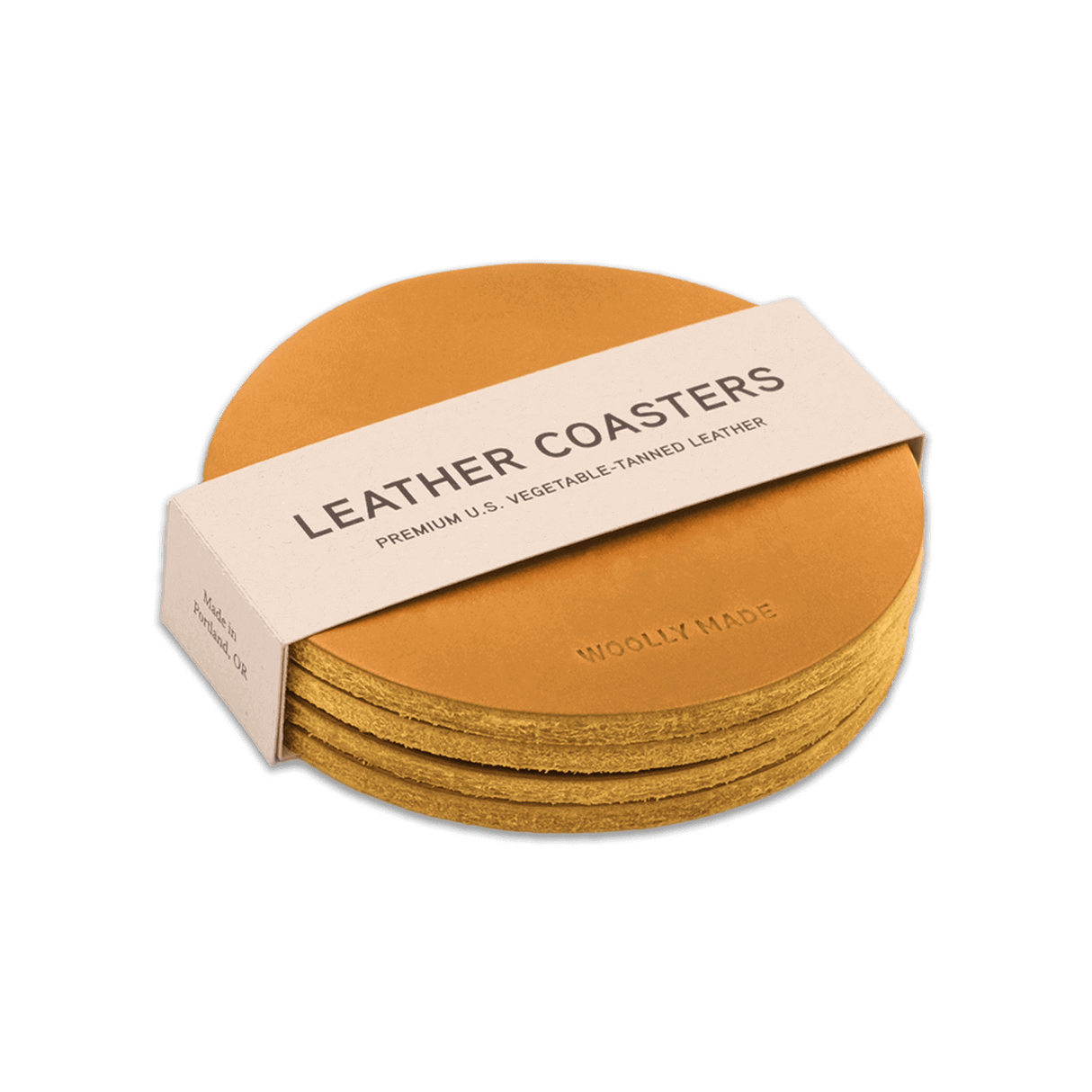 Gold leather round coaster set with hand-pressed Woolly Made logo stacked.