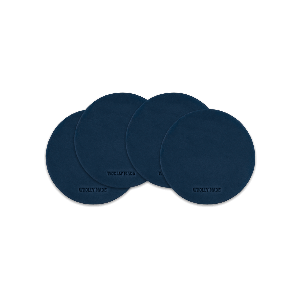 Navy leather round coaster set with hand-pressed Woolly Made logo spread out.