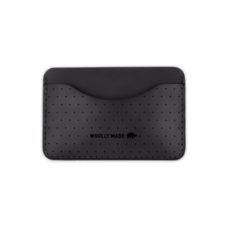 Black leather Slim Wallet with decorative perforation and etched Woolly Made logo.