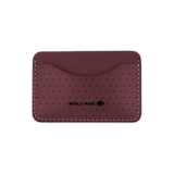 Burgundy leather Slim Wallet with decorative perforation and etched Woolly Made logo.