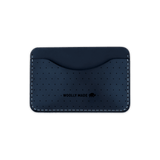 Navy leather Slim Wallet with decorative perforation and etched Woolly Made logo.