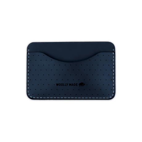 Navy leather Slim Wallet with decorative perforation and etched Woolly Made logo.