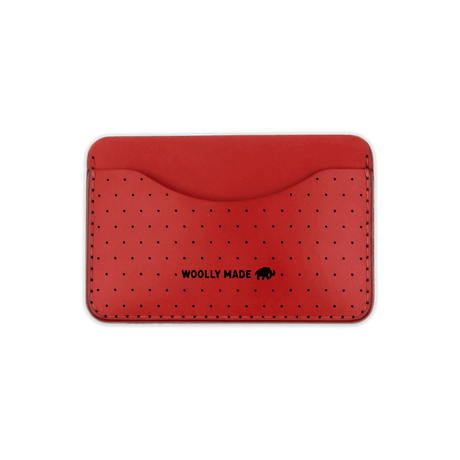 Red leather Slim Wallet with decorative perforation and etched Woolly Made logo.