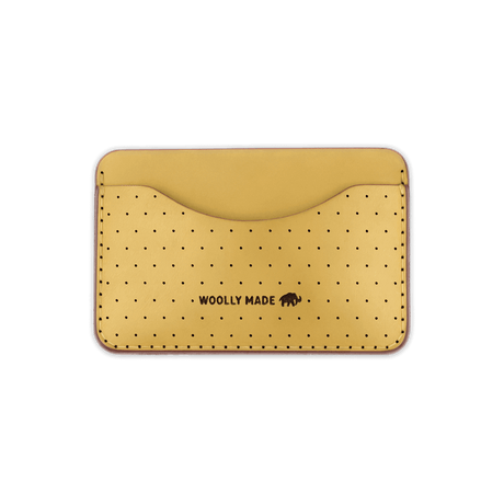 Yellow leather Slim Wallet with decorative perforation and etched Woolly Made logo.