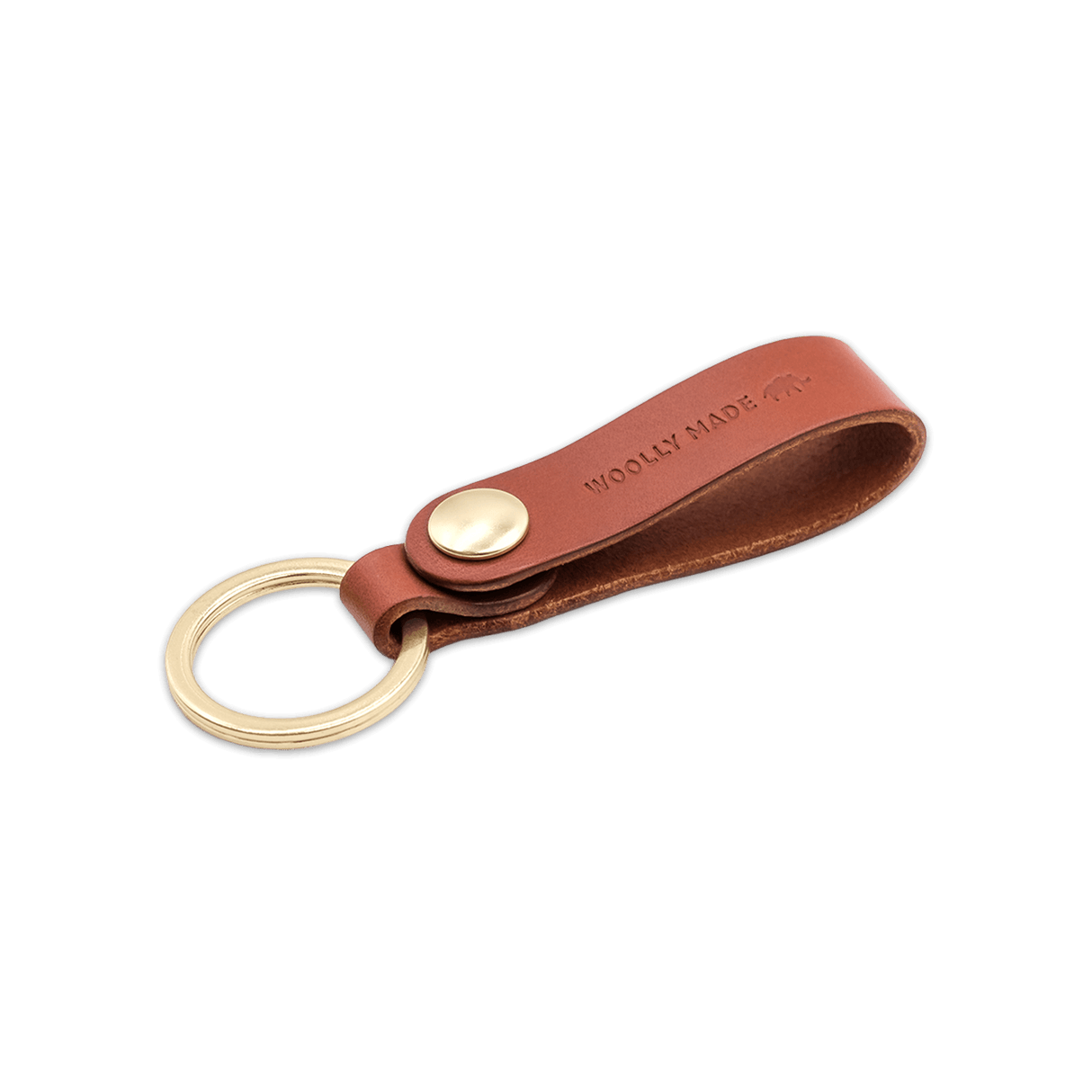 Brown leather Snap Keychain 3/4 view with brass keyring and hand-pressed Woolly Made logo.