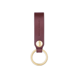Burgundy leather Snap Keychain  front view with brass keyring and hand-pressed Woolly Made logo.