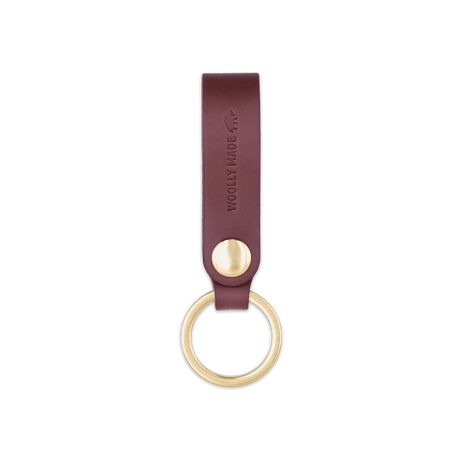 Burgundy leather Snap Keychain  front view with brass keyring and hand-pressed Woolly Made logo.