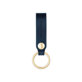 Navy leather Snap Keychain  front view with brass keyring and hand-pressed Woolly Made logo.