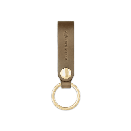 Olive leather Snap Keychain  front view with brass keyring and hand-pressed Woolly Made logo.