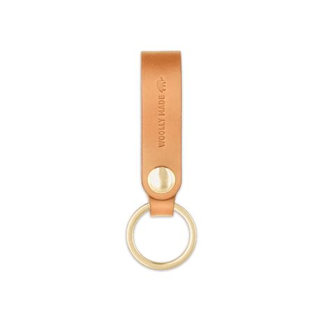 Tan leather Snap Keychain  front view with brass keyring and hand-pressed Woolly Made logo.