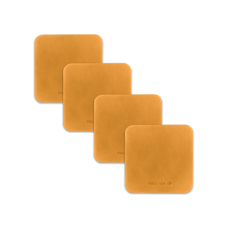 Gold leather square coaster set with hand-pressed Woolly Made logo spread out.
