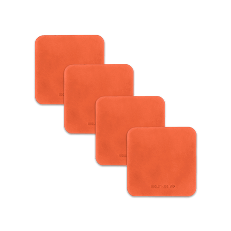 Orange leather square coaster set with hand-pressed Woolly Made logo spread out.