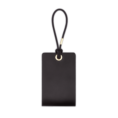 Woolly Made Standard Luggage Tag in Black with elastic cord.