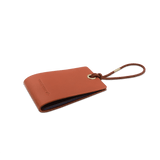 Woolly Made Standard Luggage Tag in Brown with elastic cord 3/4 view.