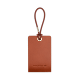 Woolly Made Standard Luggage Tag in Brown with elastic cord back view.