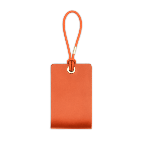 Woolly Made Standard Luggage Tag in Orange with elastic cord.