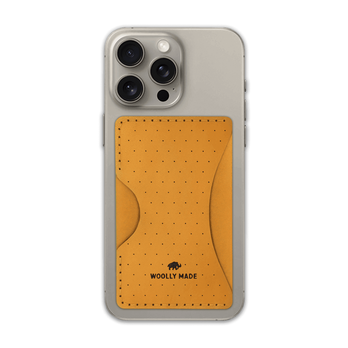 Gold leather Stick-On Wallet with decorative perforation and etched Woolly Made logo on iPhone.