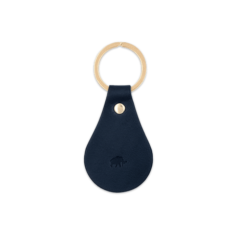 Navy leather Tab Keychain, hand-pressed Woolly Made logo, brass hardware.