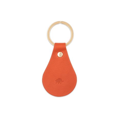 Orange leather Tab Keychain, hand-pressed Woolly Made logo, brass hardware.