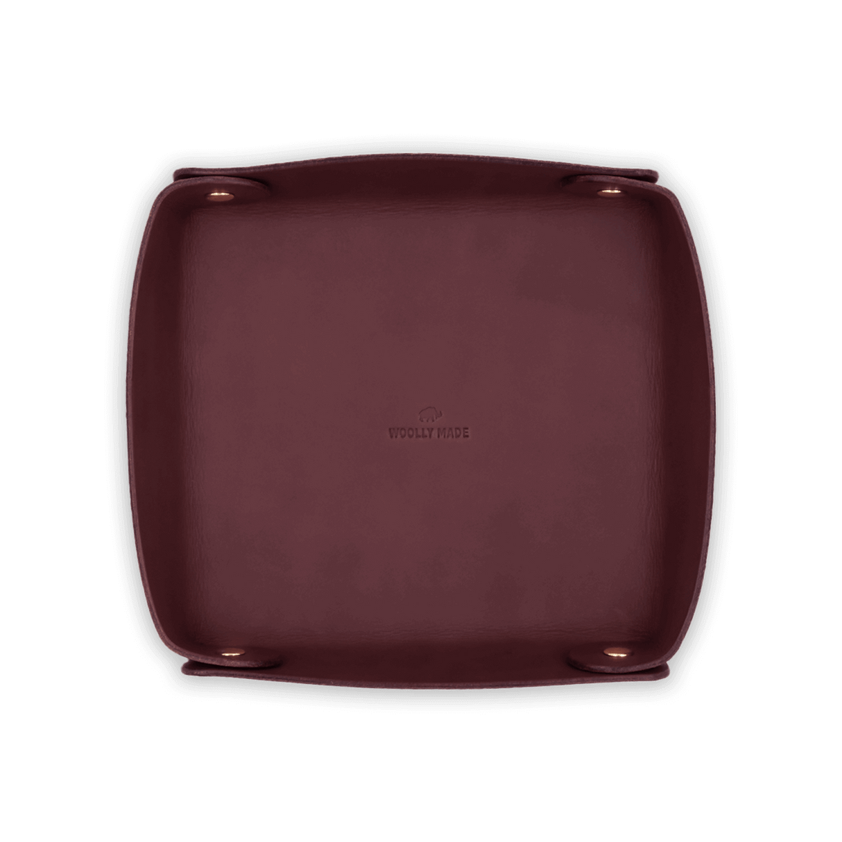 Top down view of burgundy leather Valet Tray with hand-pressed Woolly Made logo and brass hardware.